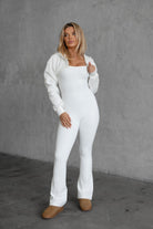 White fleece bolero-style cardigan featuring a cropped fit and zipper front by Tic Toc.