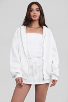 White essential fleece skort with mid-rise style and soft fabric from Tic Toc.