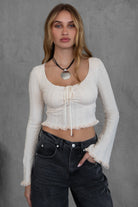 TIC TOC MARYLYN lacey cropped long sleeve top in white with lace trim and soft stretch knit fabric