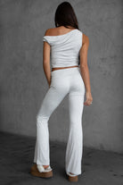 Low rise flare pants with a smooth finish, perfect for casual outfits from Tic Toc.