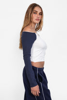 Trendy off-the-shoulder color block top in white and navy stretch fabric