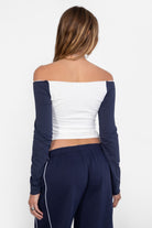 Trendy off-the-shoulder color block top in white and navy stretch fabric