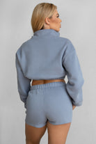 TIC TOC  french blue cropped pullover sweater with fold-over neckline and elastic waist.