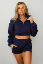  TIC TOC  Navy cropped pullover sweater with fold-over neckline and elastic waist.