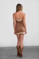 TIC TOC DA31077 LAREDO Embroidered Suede Mini Dress in soft suede with floral embroidery, studded button line detail, and a strapless fitted silhouette. Perfect for western festival outfits.