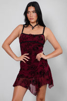  Burgundy mini dress featuring a scoop neckline, tie front detail, and ruffled hem from Tic Toc.