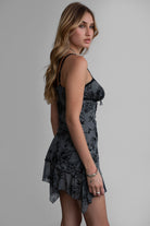 Grey mesh mini dress with empire waist and A-line silhouette, perfect for vintage-inspired looks by Tic Toc.