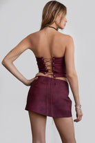 TIC TOC TA29069 BECKEE  PU Vegan Leather Corset Top. Featuring embroidered western details, and an exposed lace up back. Perfect for bold, edgy, and Western-inspired looks.