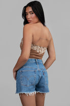 TIC TOC TA30268 MONTANA Embroidered Suede Bustier Top in soft suede with floral embroidery, button-front closure, and asymmetrical hem. Western-inspired festival top