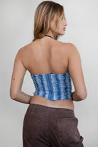 TIC TOC TA30488 FRAYE Distressed Denim Bustier. A strapless cropped corset top with frayed distressed denim edges and a hook-and-eye closure.