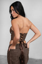 TIC TOC TA30530 GLENDORA Distressed PU Leather Corset Top in brown. Features a sweetheart neckline, boned structure, silver western embellishments, and an adjustable satin lace-up back.