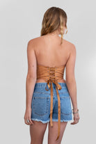 TIC TOC TA30530 GLENDORA Distressed PU Leather Corset Top in tan. Features a sweetheart neckline, boned structure, silver western embellishments, and an adjustable satin lace-up back.