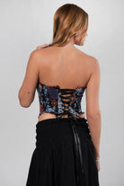 TIC TOC TC30686 CALA Tapestry Patterned Corset Top. Features a strapless design, distressed details, lace-up back, and structured fit. Perfect for festival and western-inspired outfits.