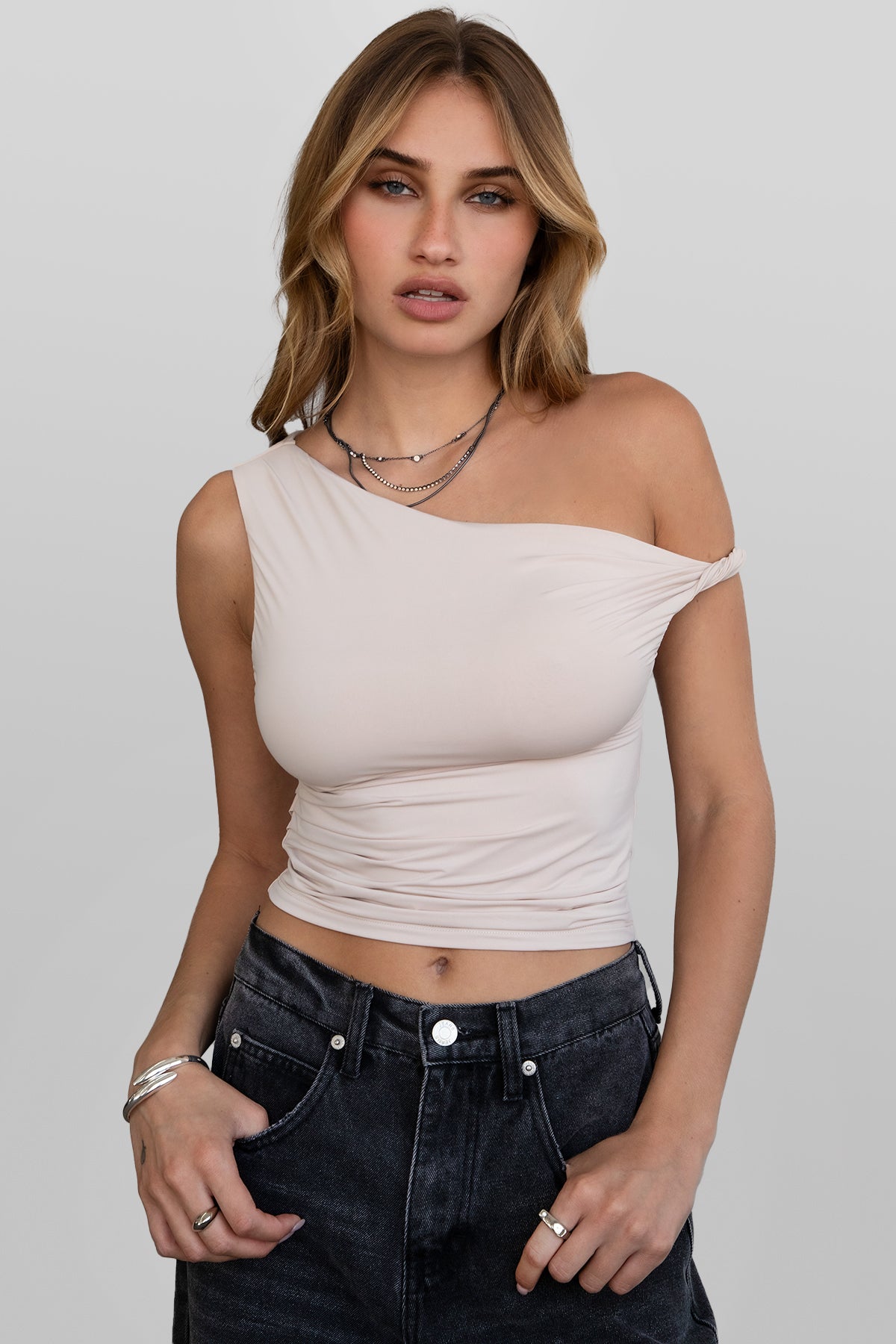 Oatmeal off-the-shoulder top with ruching and asymmetrical neckline by Tic Toc.