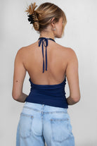 blue halter cami top with sleek spandex fabric and fitted silhouette by Tic Toc.