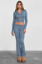 Figure-hugging sweater knit lounge set with ribbed cuffs and fold-over waistband in French blue