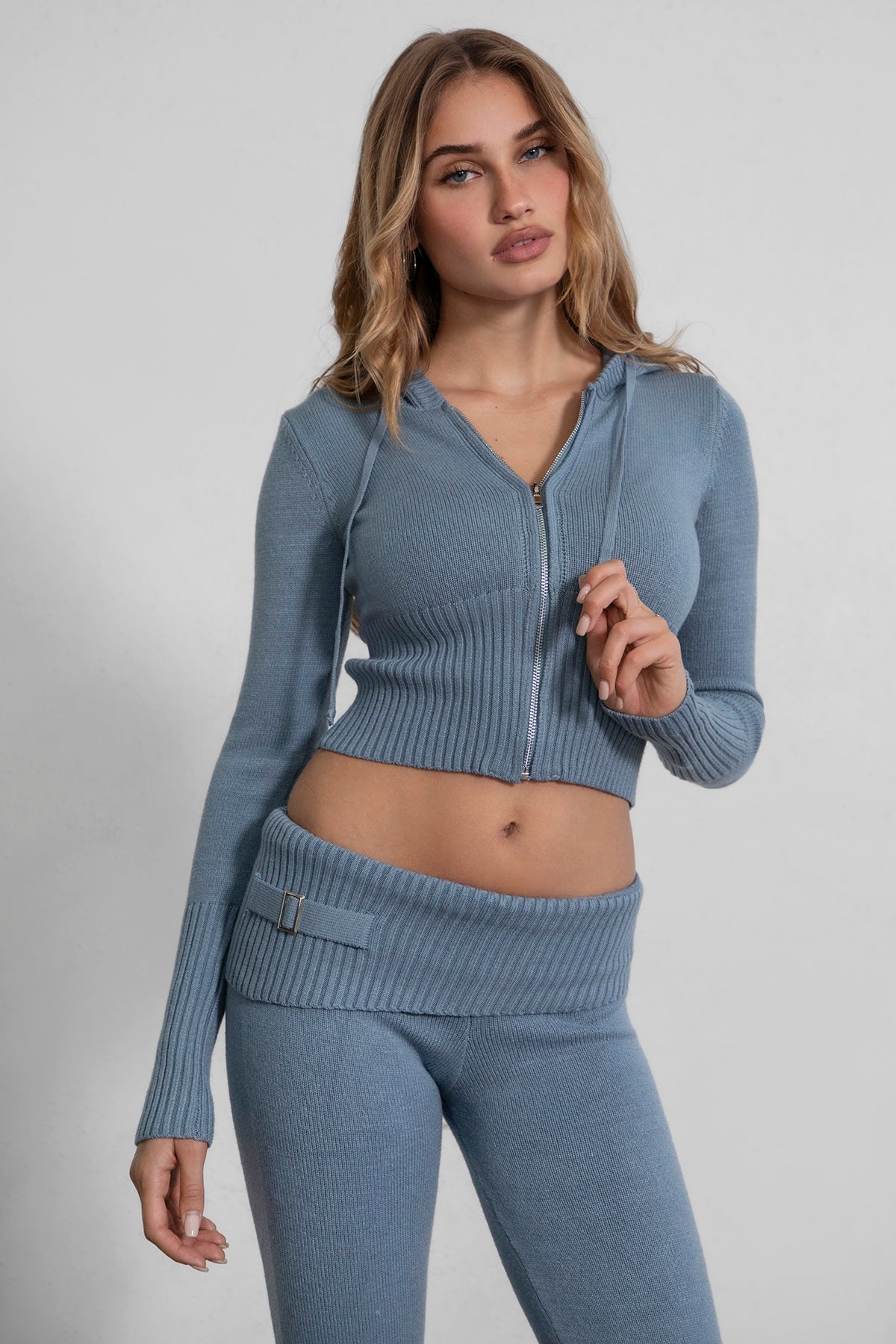 Figure-hugging sweater knit lounge set with ribbed cuffs and fold-over waistband in French blue