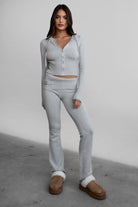 Stylish lounge set with zip-up hoodie and cozy knit flare pants by TIC TOC