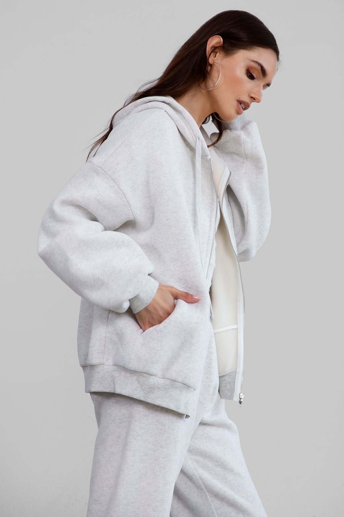 Ash oversized zip-up hoodie with thick fleece fabric and ribbed hem, perfect for casual layering by Tic Toc.