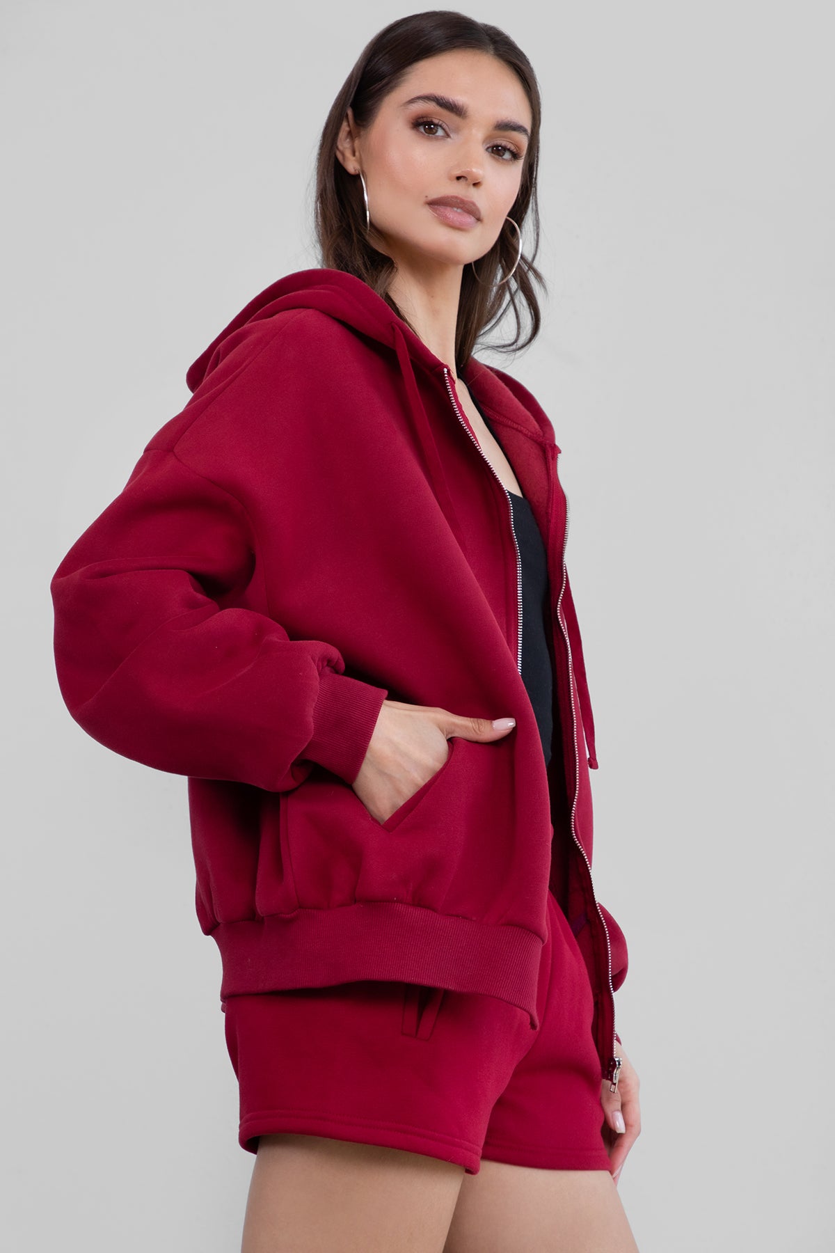 Burgundy oversized fleece hoodie with a relaxed fit, perfect for layering and casual wear by Tic Toc.