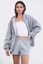 Heather grey oversized zip-up fleece hoodie with ribbed hem and cuffs for a classic casual look by Tic Toc.