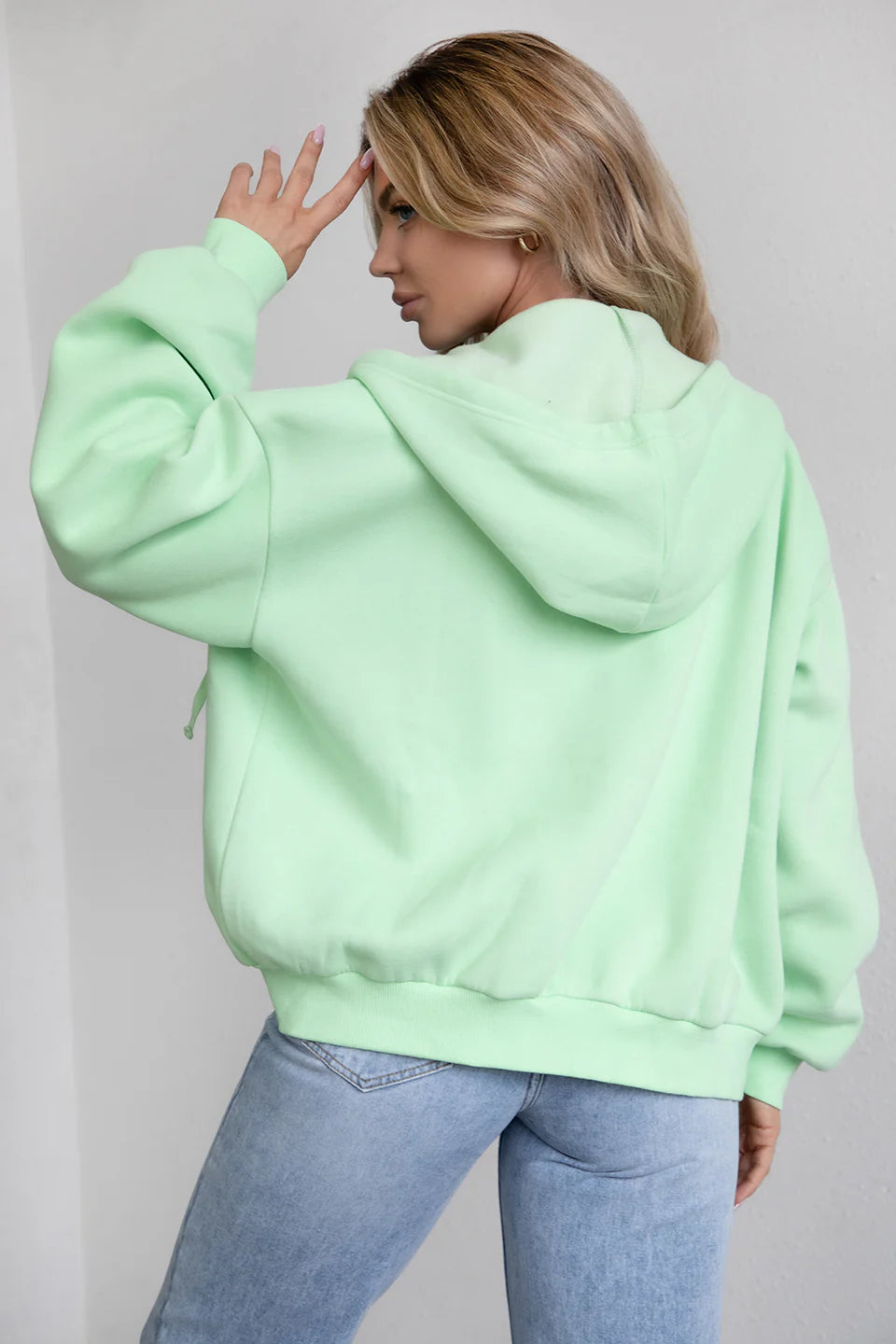 Pastel lime oversized zip-up hoodie featuring a functional zipper and smooth fleece fabric by Tic Toc.