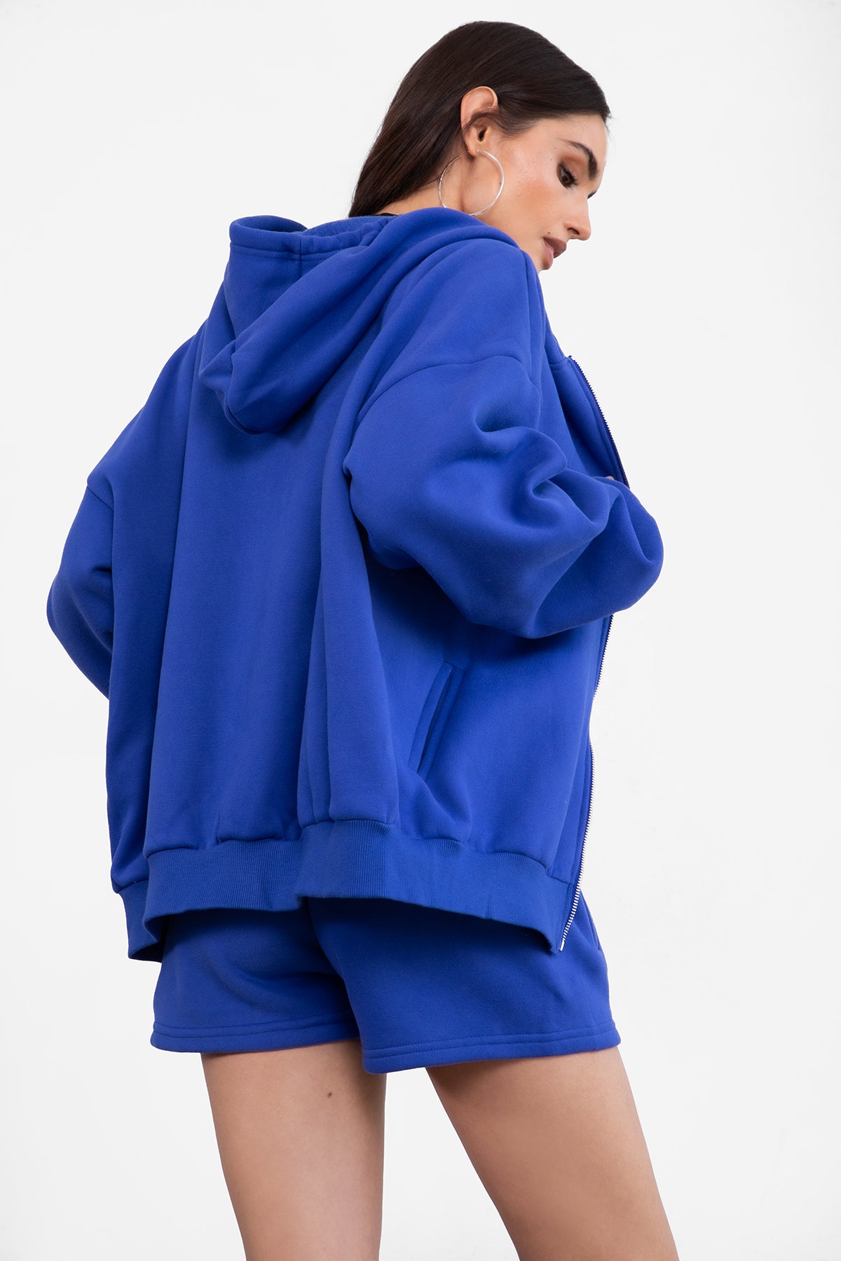 Royal blue fleece zip-up hoodie with a relaxed fit, perfect for layering during cooler weather by Tic Toc.