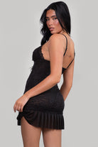 TIC TOC black lace mini dress featuring adjustable straps and a sweetheart neckline