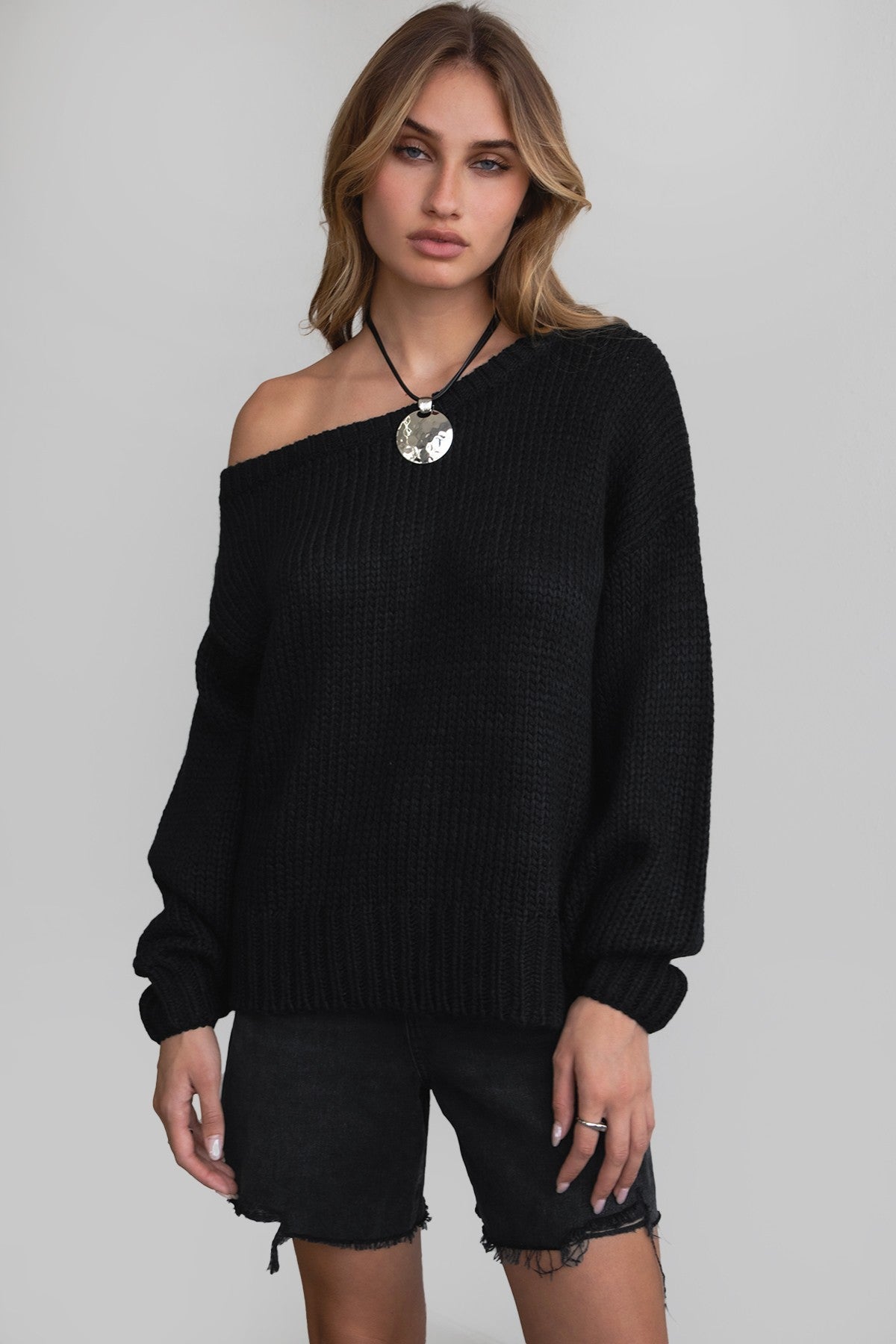 BRANDY off-the-shoulder ribbed knit sweater in black with long loose sleeves