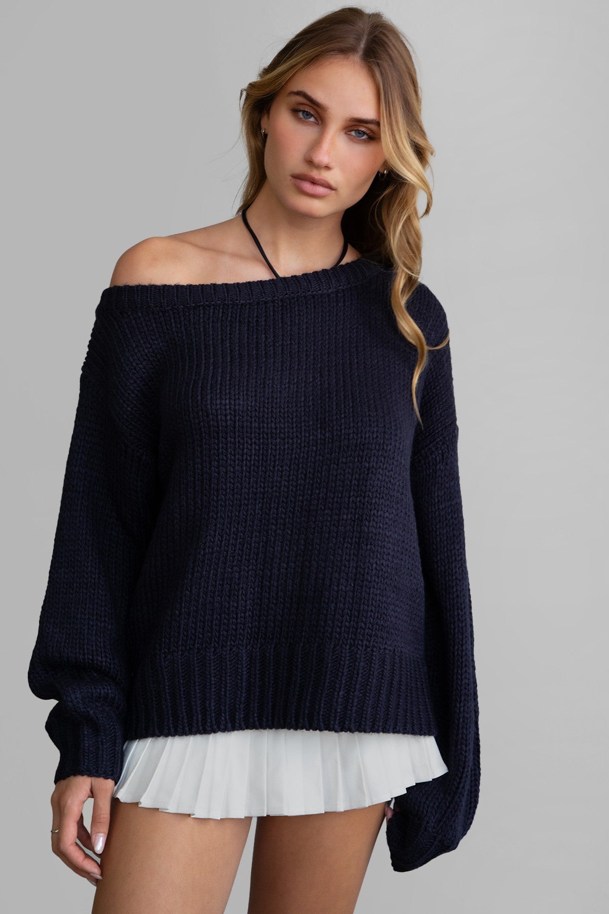 BRANDY off-the-shoulder ribbed knit sweater in black with long loose sleeves