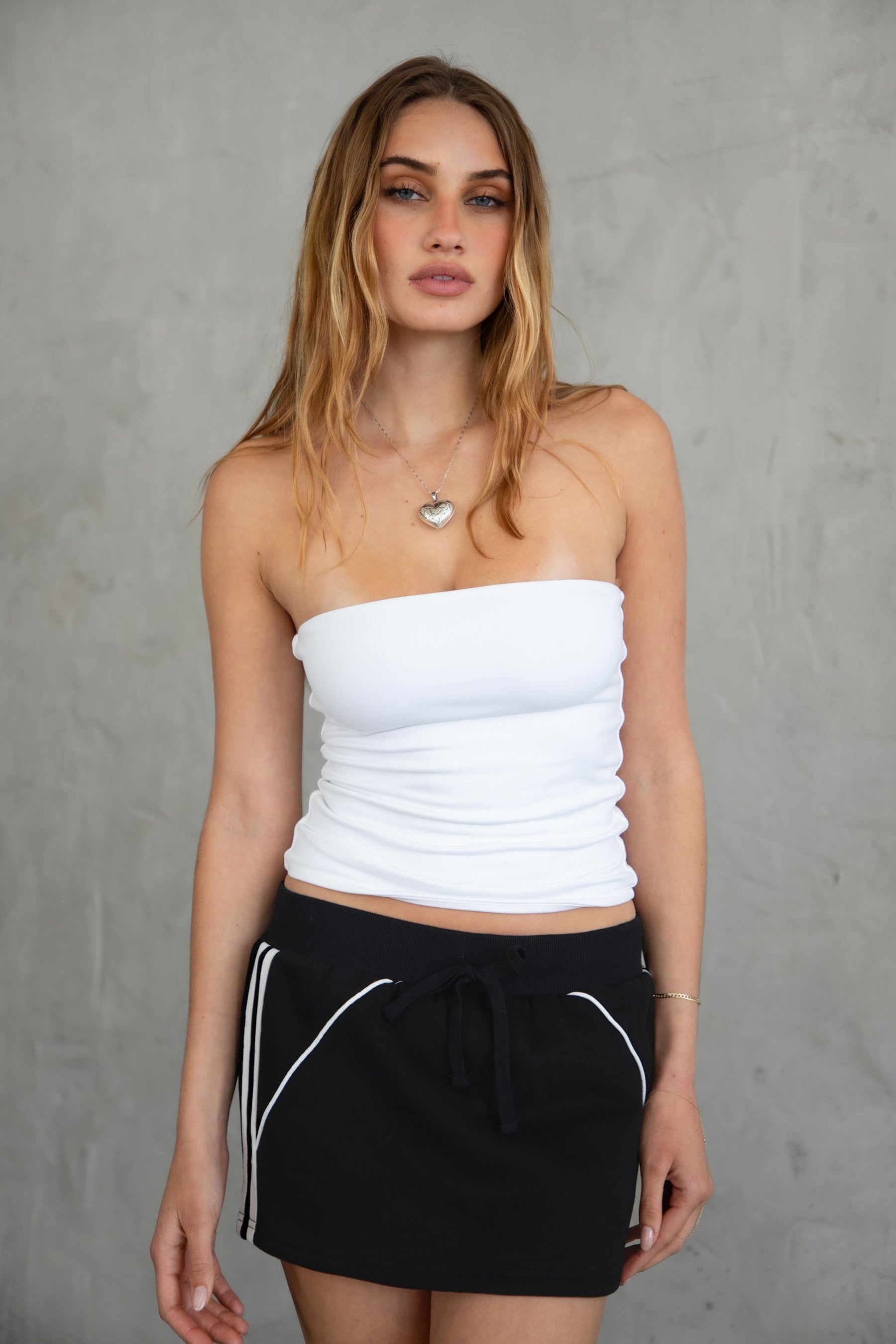 COLBI Essentials Plush Fleece Mini Skort with ribbed tie waistband and contrast piping in black