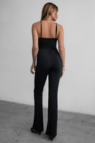 PERLA lightweight black jumpsuit with sweetheart neckline and midriff cutout by TIC TOC