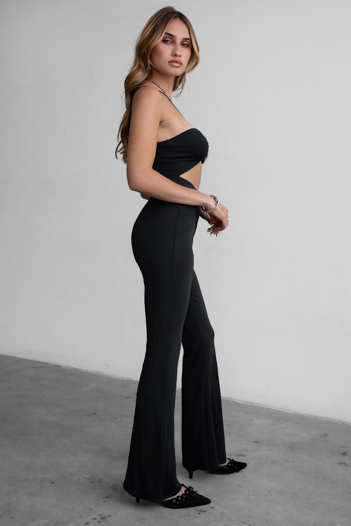 PERLA lightweight black jumpsuit with sweetheart neckline and midriff cutout by TIC TOC