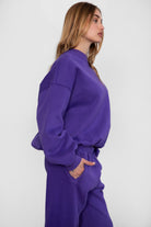 VARSITY crew neck fleece pullover sweatshirt in matching Essentials Plush Collection shades in purple 