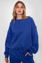 VARSITY crew neck fleece pullover sweatshirt in matching Essentials Plush Collection shades in royal blue