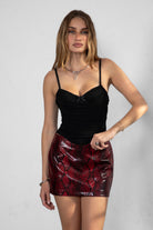 TIC TOC NAOMY snake print vegan leather mini skirt in low-rise style