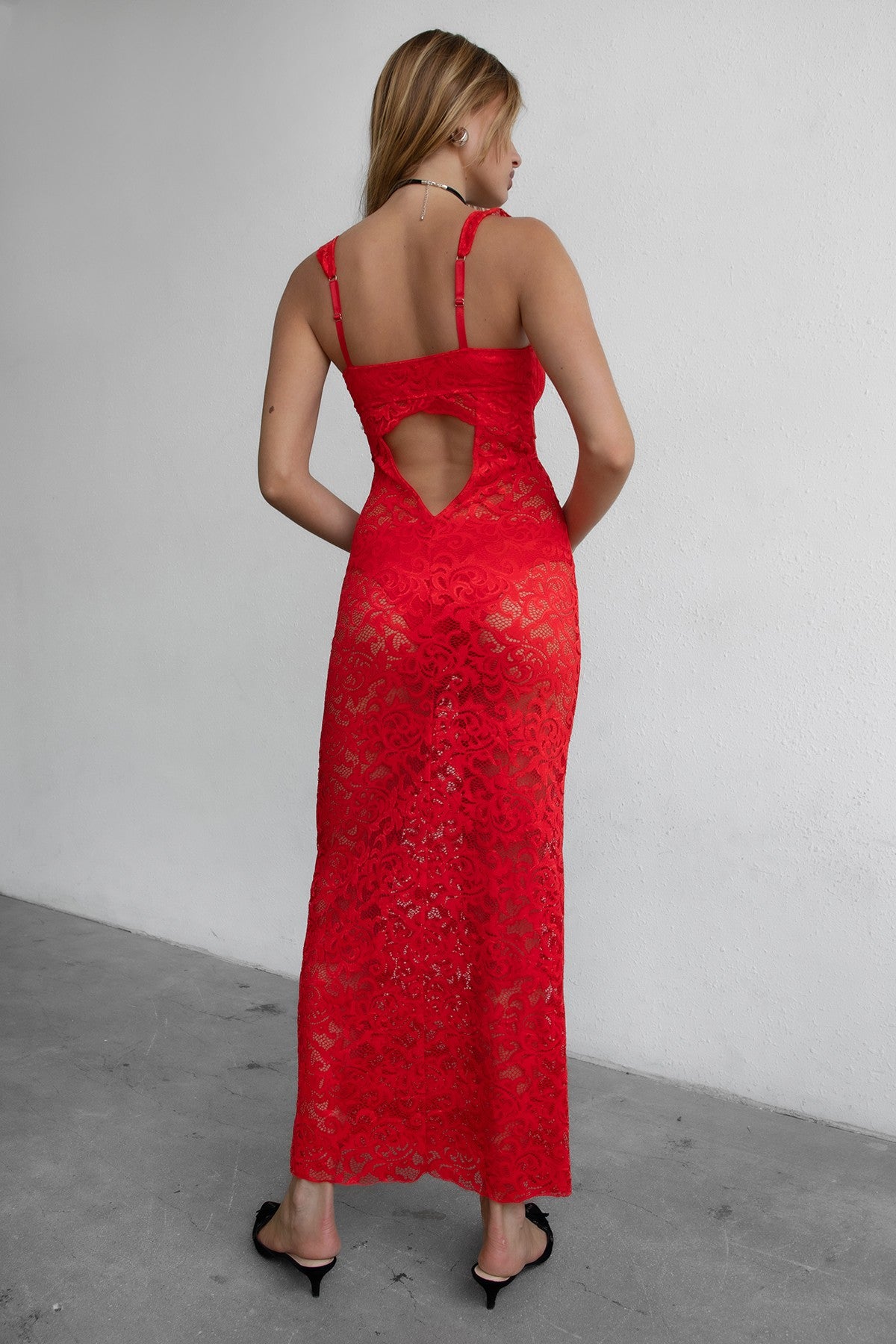 Romantic red lace maxi dress featuring adjustable straps and sheer lace fabric by TIC TOC