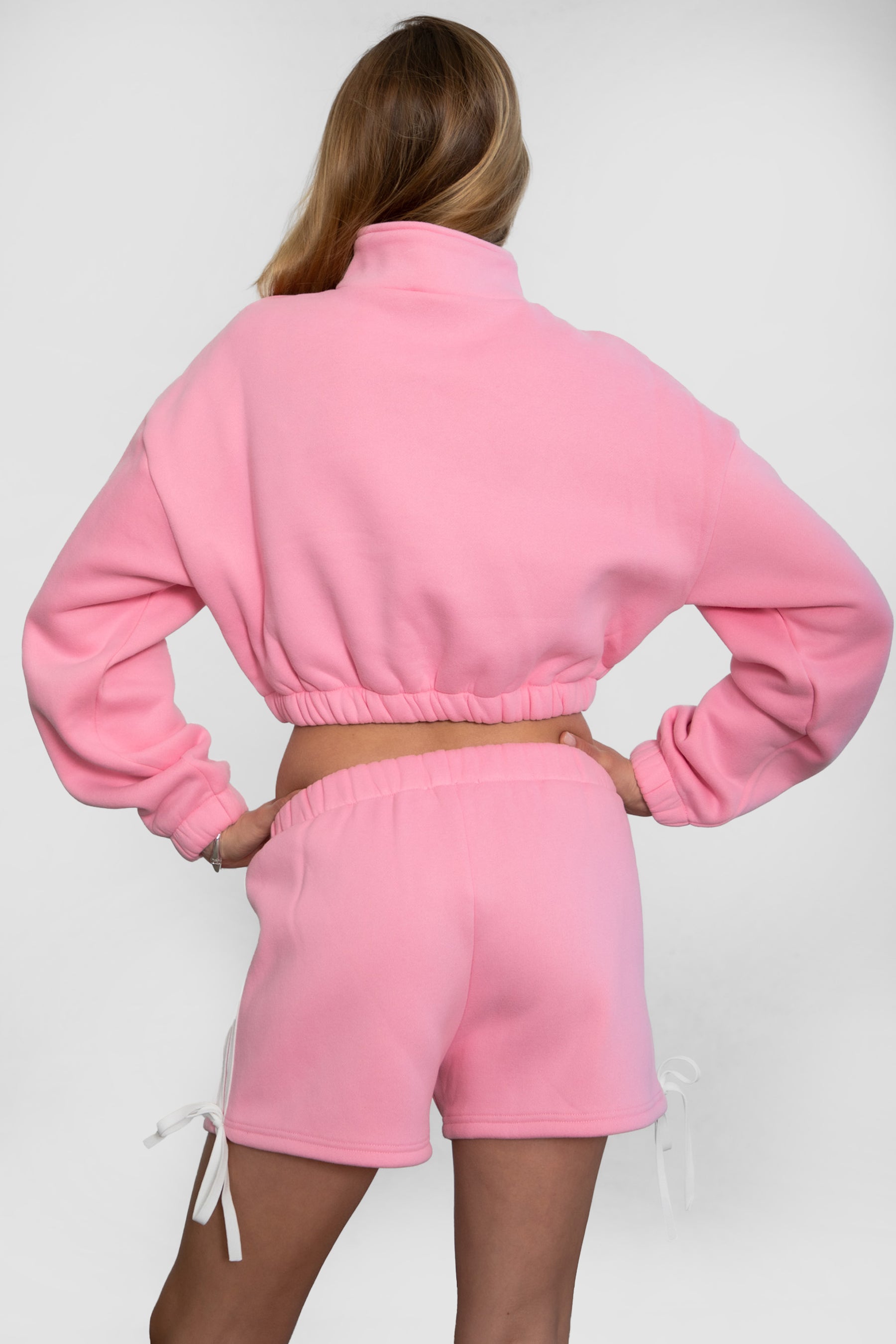 Game day mid-rise fleece shorts in cozy plush fabric with adjustable waistband color pink