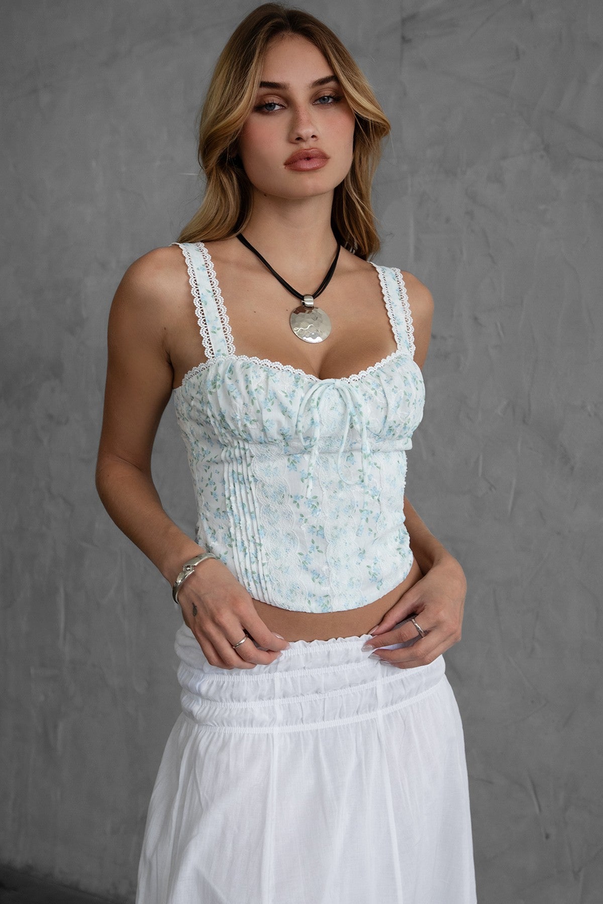 Cottage-core-inspired floral milkmaid corset top with sweetheart neckline