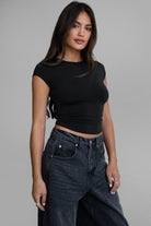 MADISON sleek black short sleeve top with hip-length fit by TIC TOC