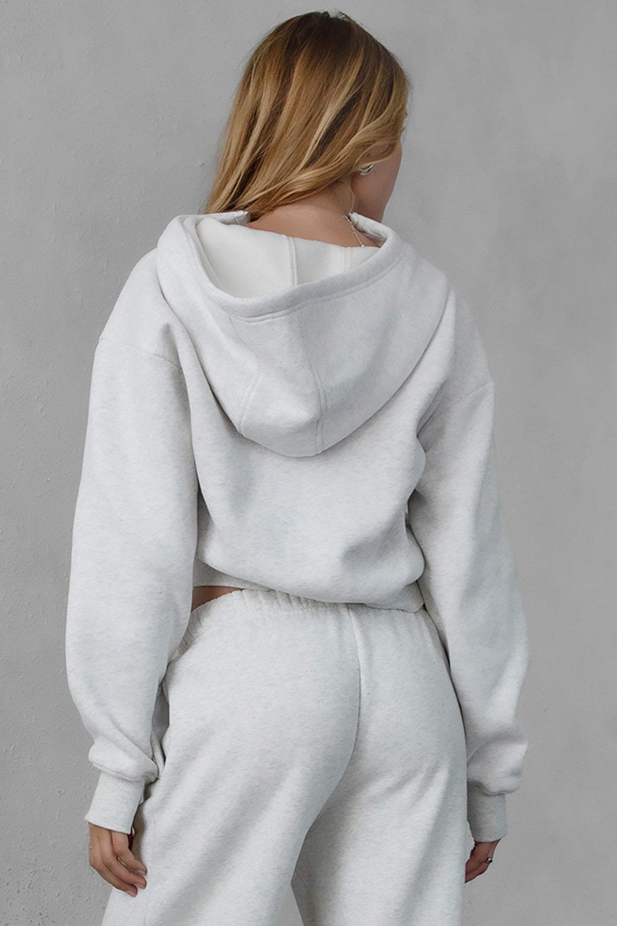 TIC TOC ROMEE Scuba Half Zip Hoodie in heather white, with a kangaroo pocket and ribbed hem