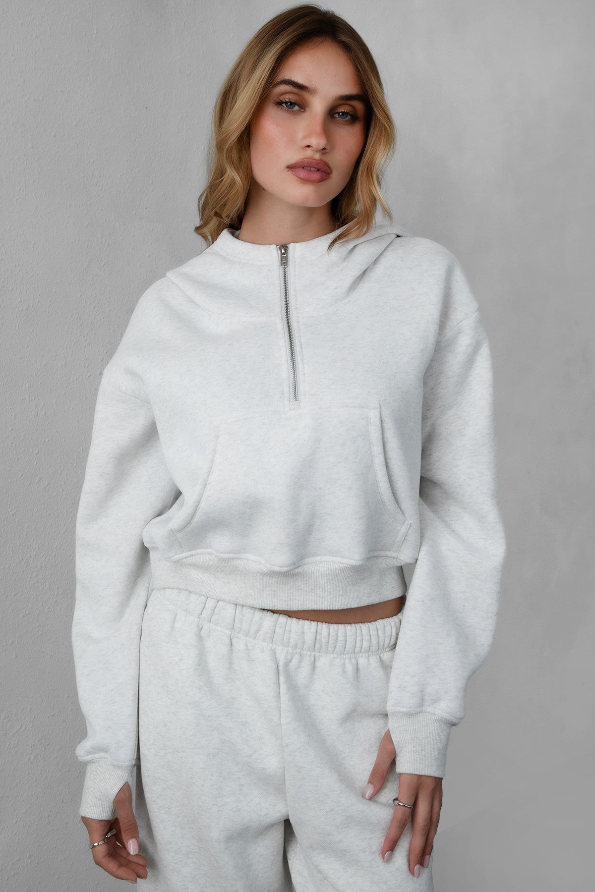 TIC TOC ROMEE Scuba Half Zip Hoodie in heather white, with a kangaroo pocket and ribbed hem