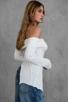 Asymmetrical hem detail on GIINA Knit Top by TIC TOC in ivory