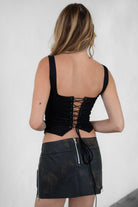 Western-style suede corset in black with intricate embroidery by Tic Toc