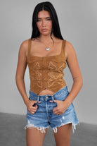 Tan suede embroidered corset top with asymmetrical hem by Tic Toc