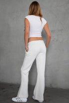 Soft and cozy JIYA flare leg fleece sweatpants by TIC TOC in heather white