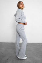 Soft and cozy JIYA flare leg fleece sweatpants by TIC TOC in heather grey 