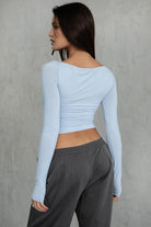 Stylish asymmetrical boat neck cropped top by TIC TOC, baby blue