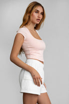 TIC TOC LAHNA Short Sleeve Baby Tee in blush, featuring a low scoop neckline and cropped fit