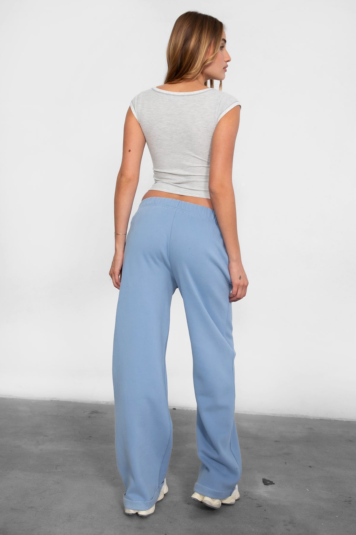 LANI wide-leg joggers in stone blue fleece, featuring elastic waistband and adjustable drawcord